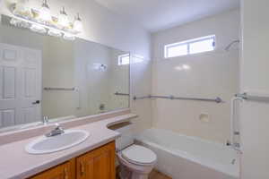 Full bathroom featuring vanity and shower / bath combination