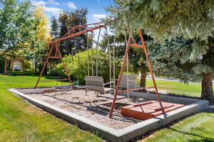 View of playground featuring a yard