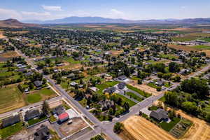 Aerial view of residential area featuring mountains
