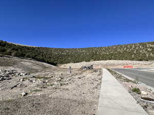 View of asphalt street with sidewalks
