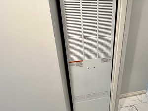 Detailed view of a heating unit and baseboards