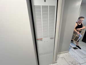 Detailed view of a heating unit and baseboards