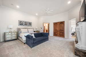 Bedroom featuring ornamental molding, carpet, a ceiling fan, recessed lighting, and connected bathroom