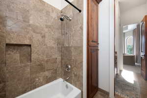 Bathroom featuring shower / bathtub combination