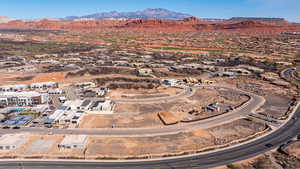 Aerial view of residential area featuring mountains