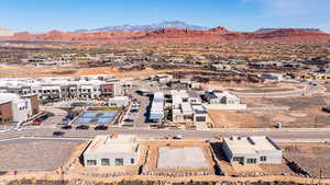 Aerial view of residential area with a mountainous background