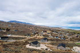 View of mountain backdrop with rural landscape