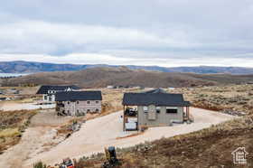 Drone / aerial view of a mountain backdrop