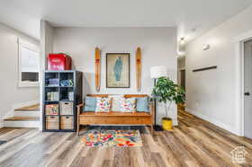 Interior space featuring wood finished floors and stairway