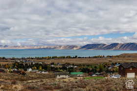 View of mountain background featuring a nearby body of water