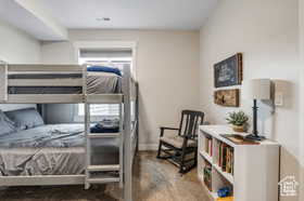 Bedroom featuring baseboards