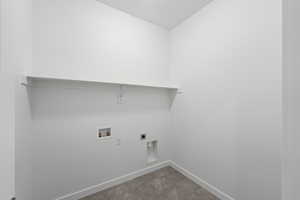 Laundry area featuring electric dryer hookup and hookup for a washing machine