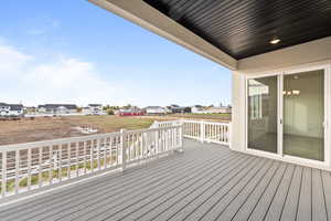 Wooden deck with a residential view