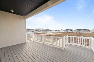 Wooden deck featuring a residential view