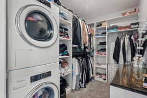 this is the walk-in closet for the apartment and this washer /dryer will be included