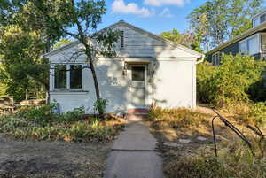 View of front of property featuring brick siding
