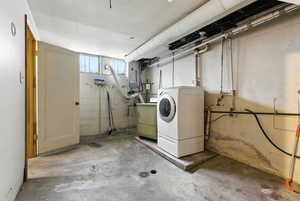 Basement with washer / clothes dryer