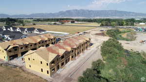 Bird's eye view of the townhomes in their beautiful surroundings