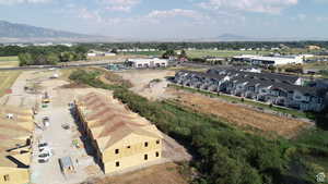 Aerial view of residential area with a mountainous background