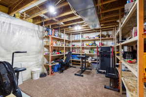 Unfinished storage/ bedroom, window is available if wanting 5th bedroom