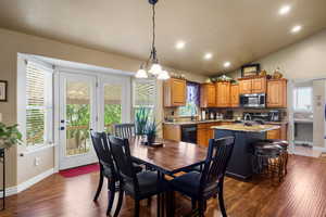 Dining space with lofted ceiling, Lvp flooring