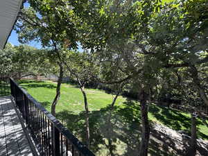 View of fenced backyard