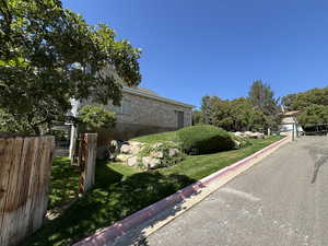 View of side of property with brick siding