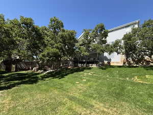 View of yard with a deck