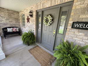 Entrance to property with covered porch