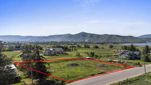 View of rural area featuring property boundaries highlighted and mountains