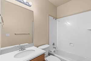 Bathroom with tub / shower combination and vanity