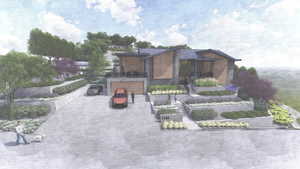 View of front of house with driveway and a garage