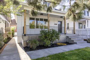 Entrance to property with covered porch