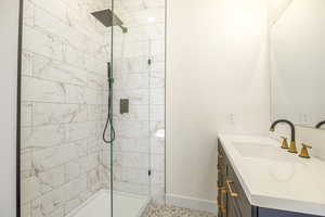 Primary bath featuring vanity and a walk in shower