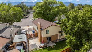View of subject property featuring a mountain backdrop