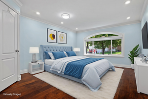 Bedroom with ornamental molding, dark wood-style floors, and recessed lighting