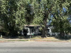 View of front of property with a front lawn
