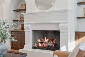 Detailed view of a warm lit fireplace