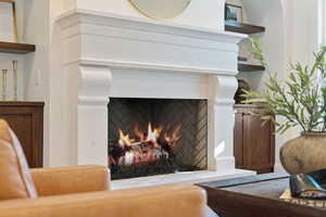 Detailed view of a warm lit fireplace