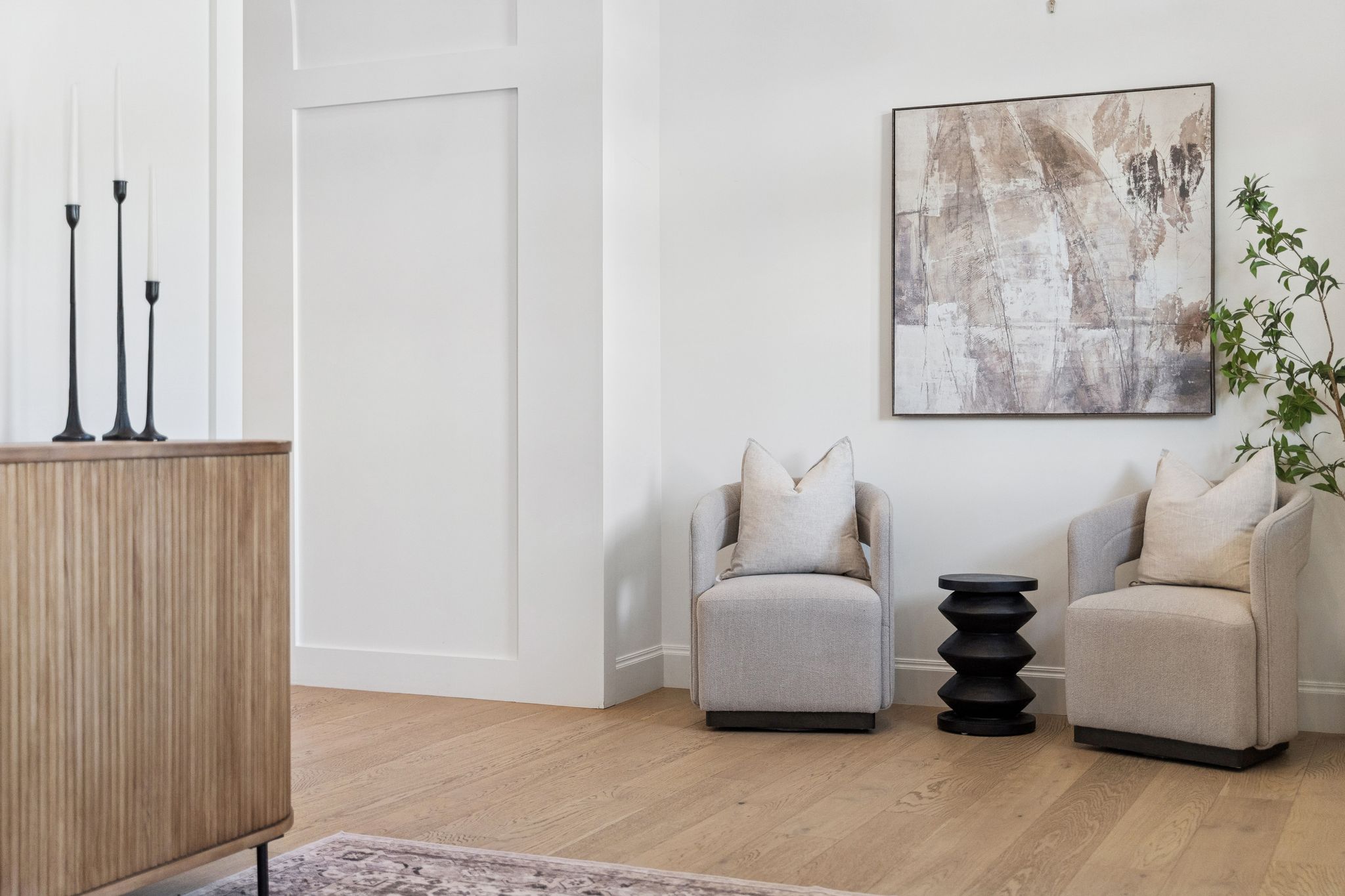 Living area with light wood-type flooring and baseboards