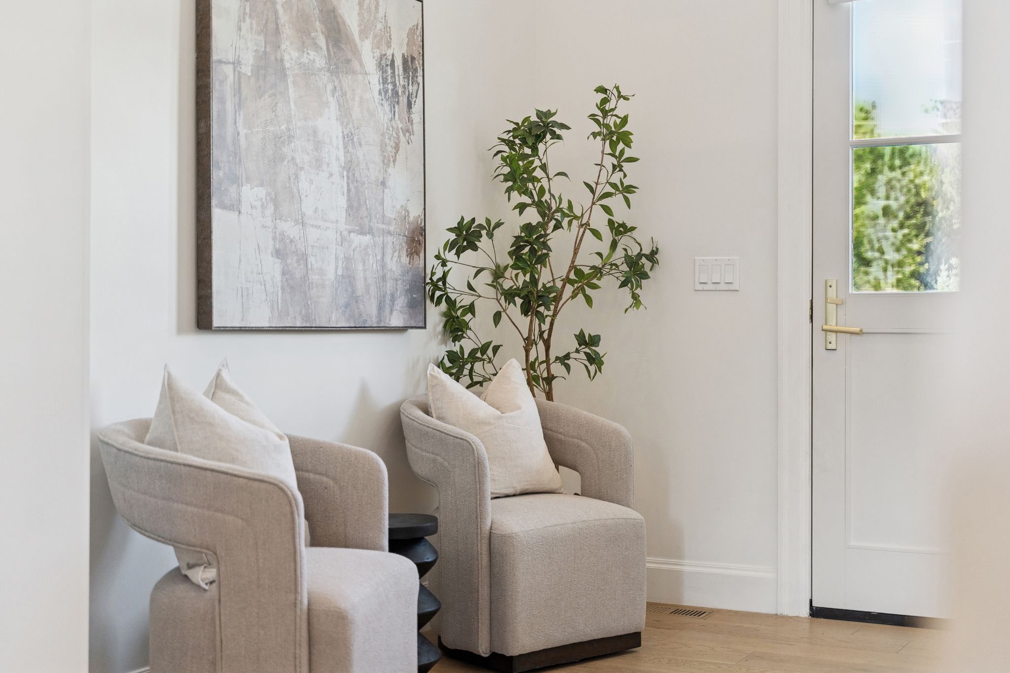 Sitting room featuring wood finished floors and baseboards