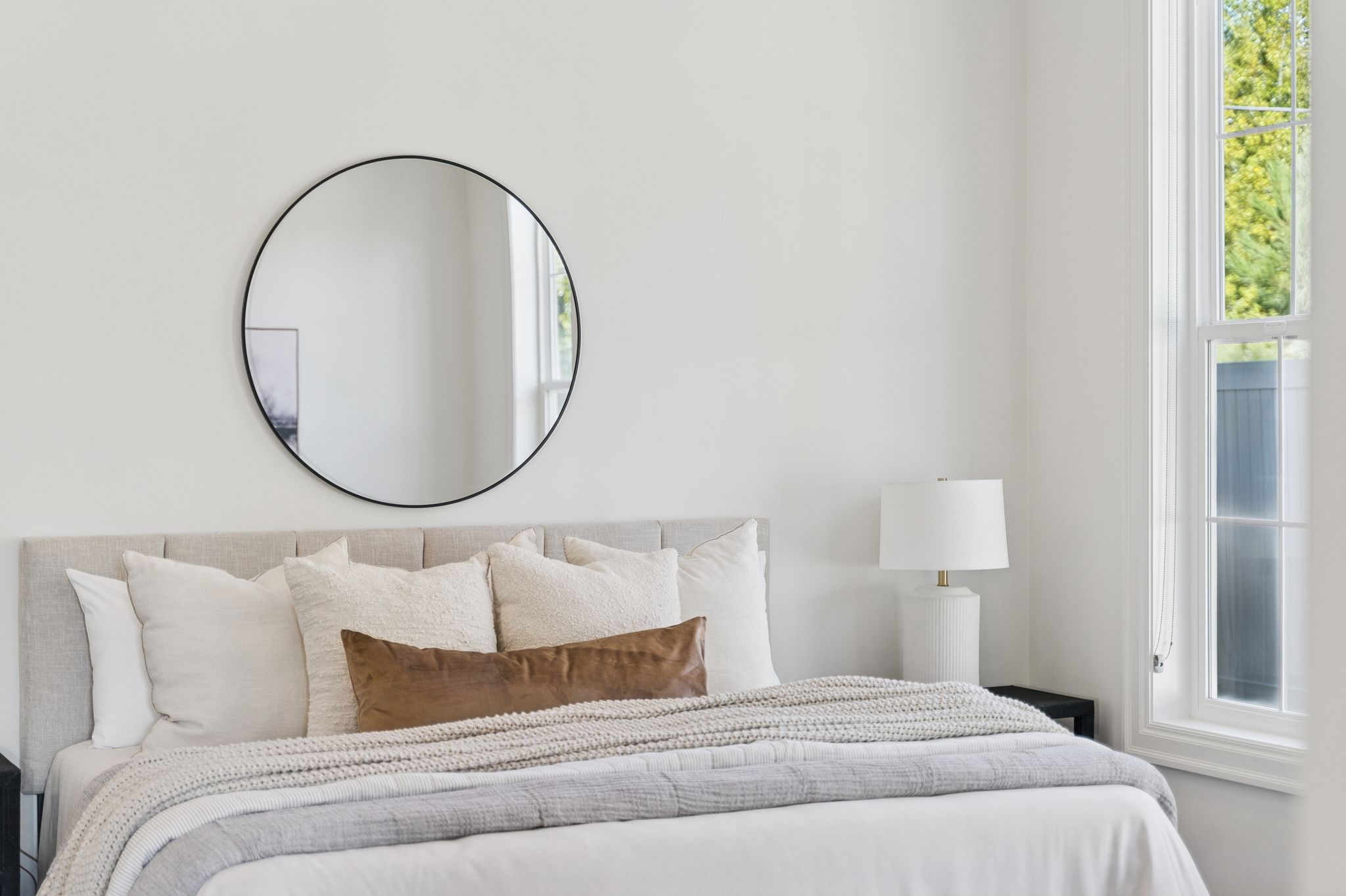Bedroom featuring multiple windows