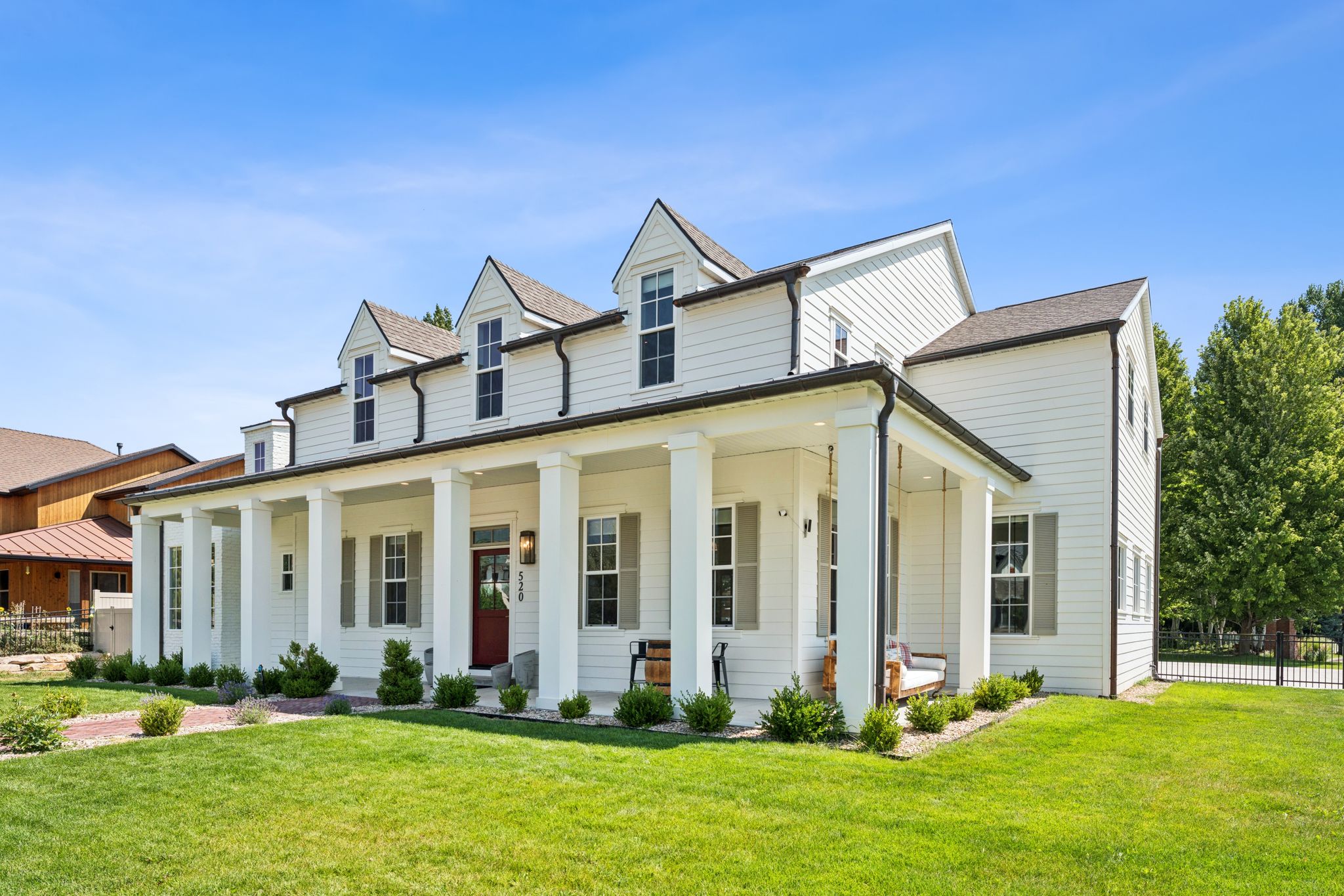 View of front of house with covered porch
