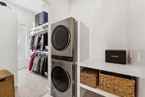 Laundry room with stacked washer / dryer