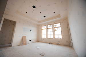 Empty room with a raised ceiling