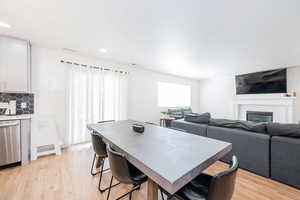 Sliding glass doors offset dining area
