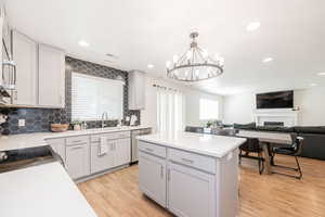 Modern grey cupboards and lighting