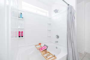Primary bath soaking tub with shower