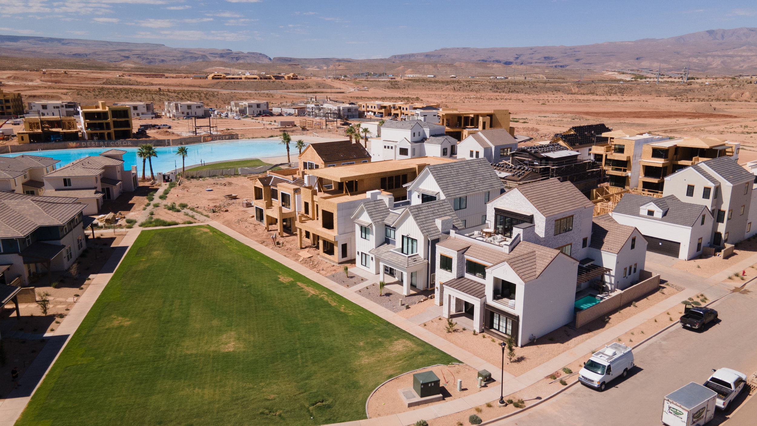 Aerial view of residential area featuring a mountain backdrop