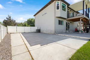 Rear view of house with a patio